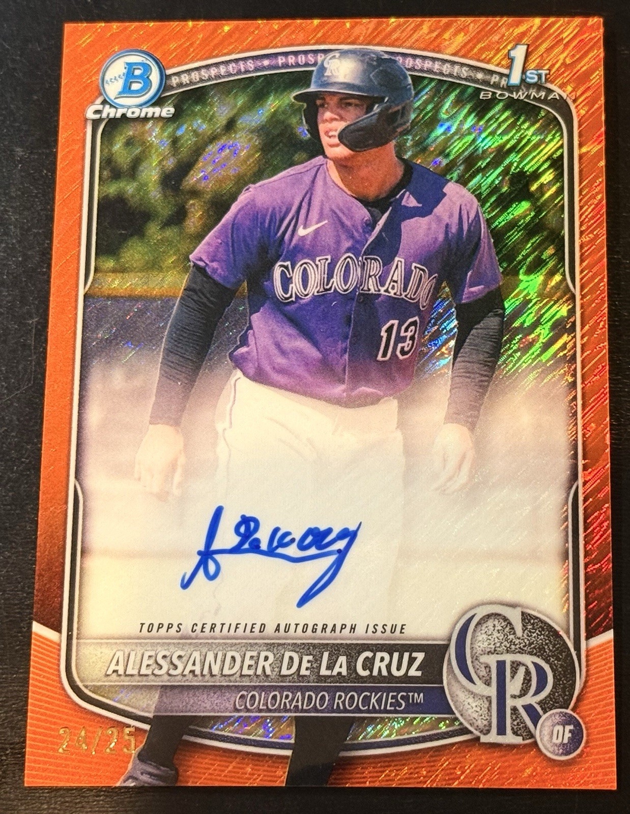 2025 Bowman Chrome Alessander De La Cruz Auto Orange Wave 1st #24/25 Rockies