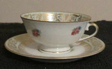 LANTERNIER LIMOGES HAND PAINTED  CUP & SAUCER
