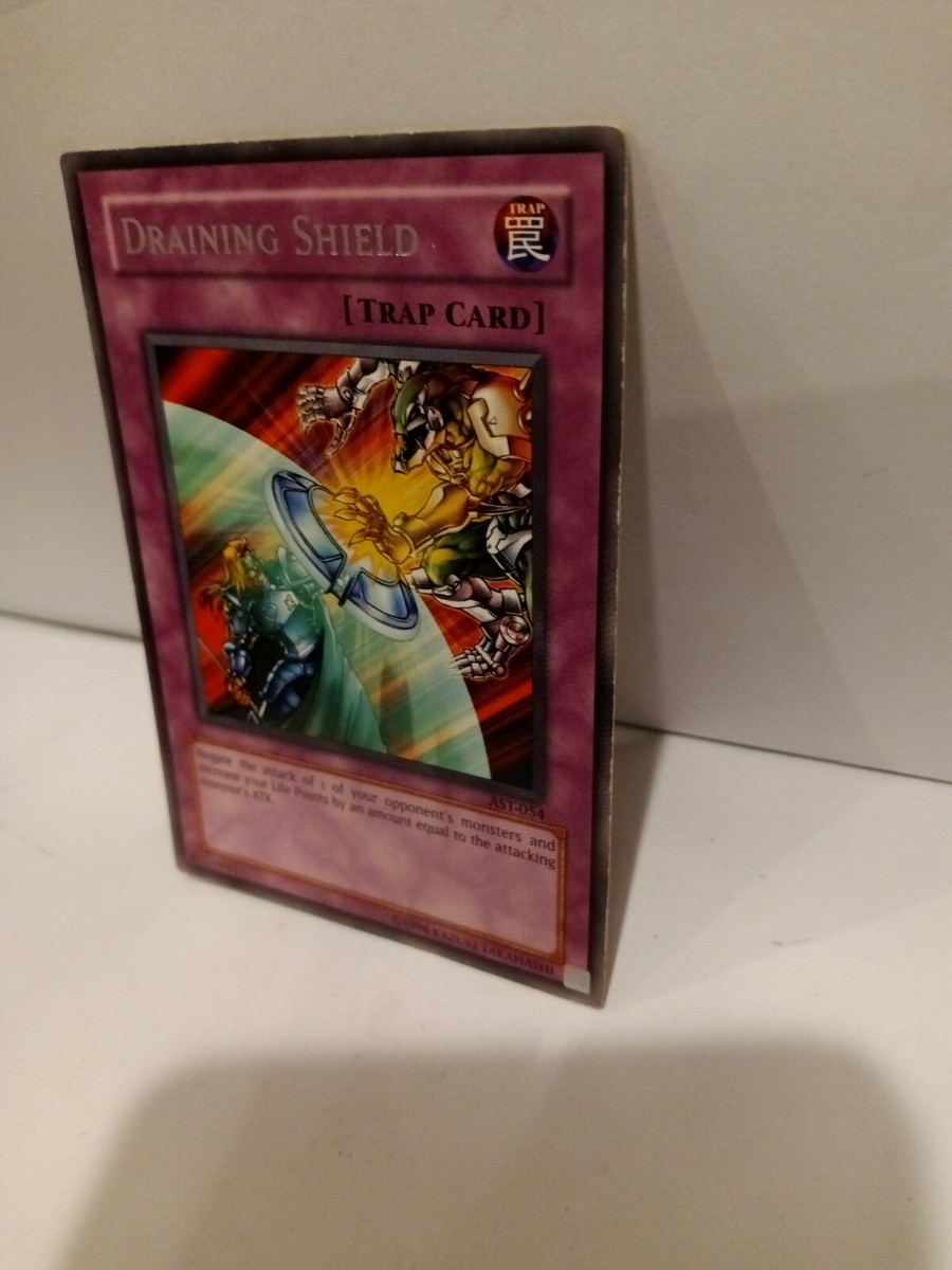 Yu-Gi-Oh! Karte „Draining Shield“ (AST-054) – Rare, 1st Edition, Aus Dem Ancient Sanctuary Set, Sammlerkarte