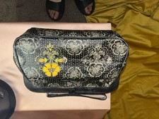 Petunia Pickle Bottom Cross Town Clutch Diaper Changing Pad Black Yellow Floral