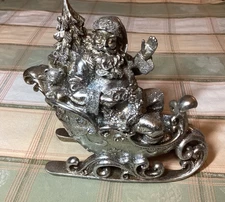 K & K Interiors 12 Inch Silver Santa in Sleigh Tabletop Christmas Decoration