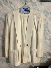 Business casual two-piece skirt suit for women.