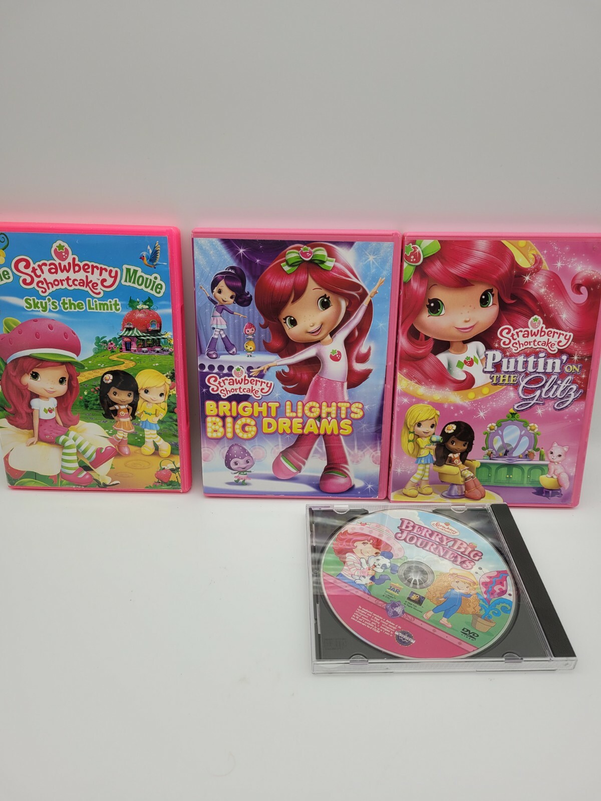 Strawberry Shortcake 4 DVDs lot. Sky's the limit, Puttin on the Glitz