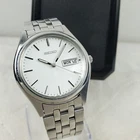VINTAGE SEIKO 7N43-9048 DAY/DATE JAPAN MOV'T SILVER TONE QUARTZ MEN'S WATCH