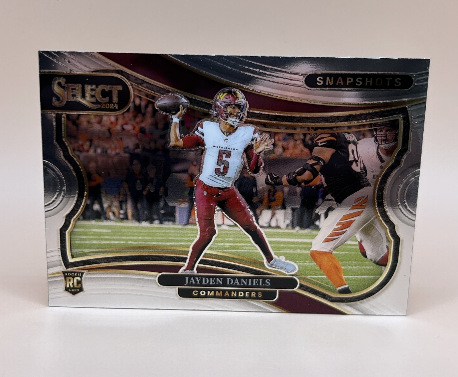 2024 Panini Select - Snapshots Jayden Daniels #15 Silver Prizm (RC)