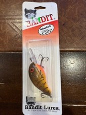 Pre-Pradco Bandit 200 - Lg. Red Pack w/ Triple Grip - Brown Craw Org Belly - 204