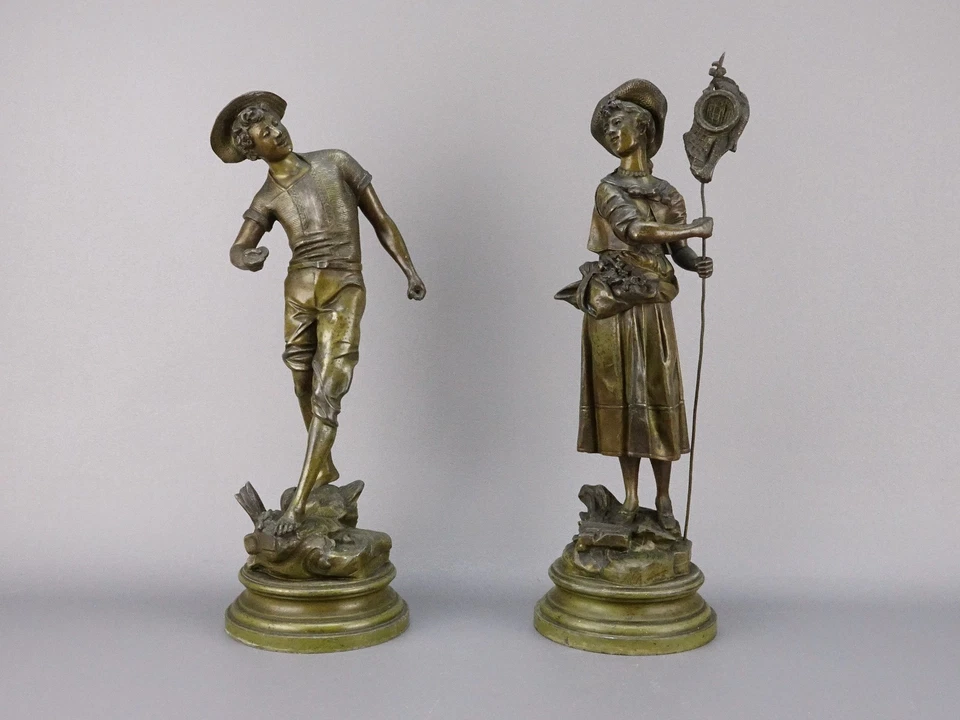 Paire de statues anciennes en régule de Lavergne – Jeu de galet - Belle Époque - Photo 1/4