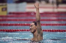 Daichi Suzuki of Japan celebrates winning the Men's 100 metres Bac- Old Photo 2