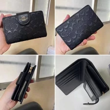 Coach Medium Corner Zip Wallet In Signature Canvas - Embossed With Logo