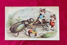 Vintage Muzzy's Corn Starch Trade Card . . Cherubs Battling Giant Beetle