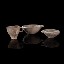 Iron Age handle cup and two bowls