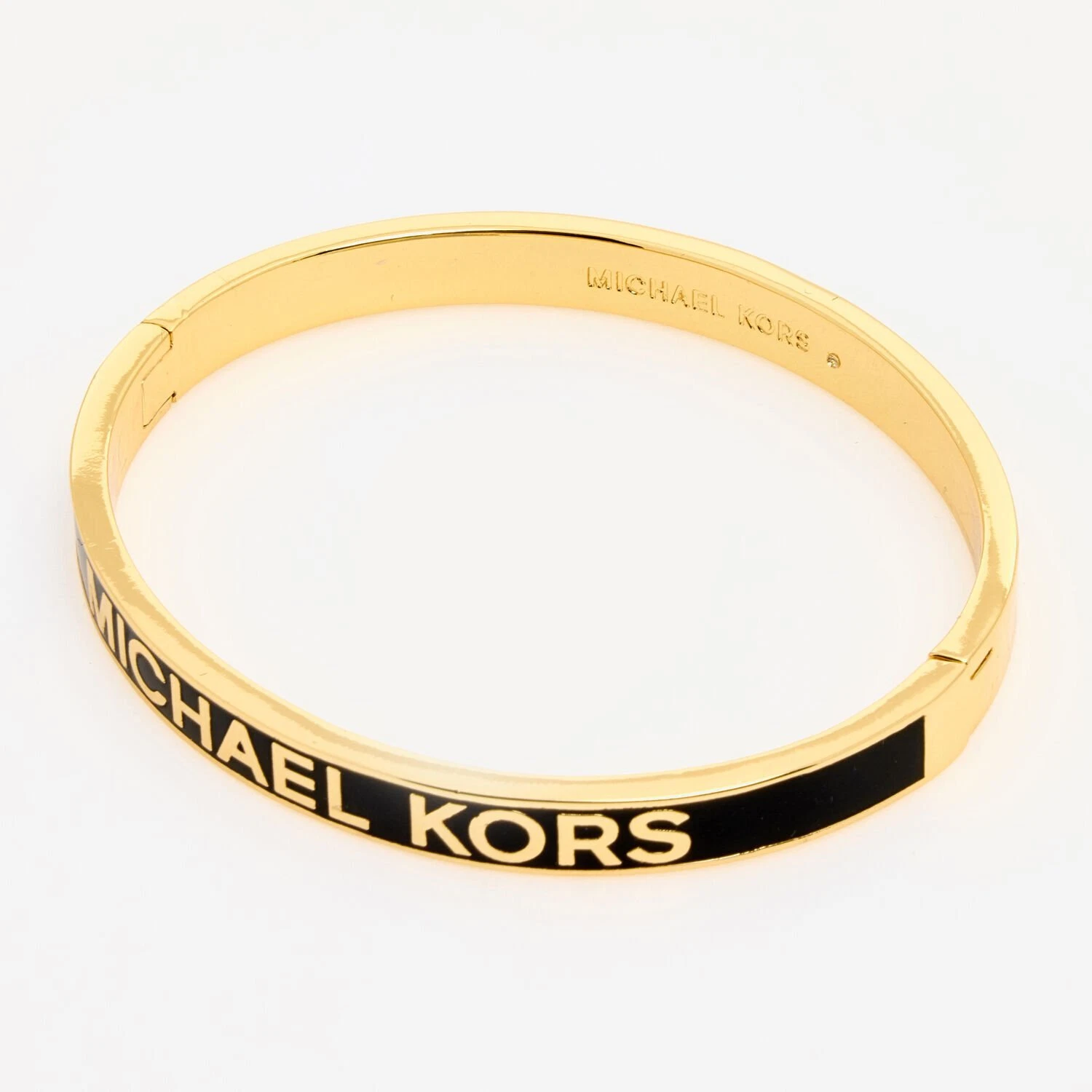 Bracciale Michael Kors ottone logo oro nero MKJ8115710