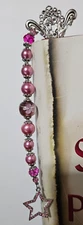 Pink beaded bookmark with a star charm