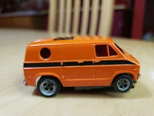 Aurora AFX Dodge Van HO Slot Car. Needs Chassis Work. Excellent Orange/Black.