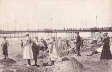 Scheveningen, Hague - NETHERLANDS - 1906: Beach, long dresses, hats, suits