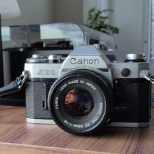 Canon AE-1 Silver Film Camera with FD 50mm f/1.8 Lens WORKING MINT CONDITION