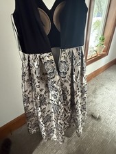 David’s bridal prom dress size 8, black top, floral skirt with sparkle detail.