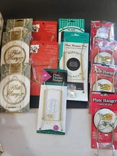 Lot of 12 Metal (Plastic Coated Metal) Wall Hangers Plates 