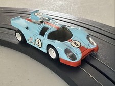 Lighted Tyco Gulf Porsche 917 Lt Blue/Orange Slot Car on a Reconditioned Chassis