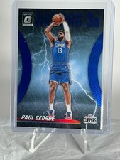 2023-24 Panini Optic Raining 3's Blue /49 SP Paul George #6
