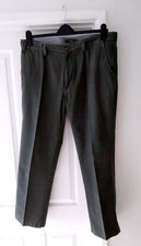 mans green trousers size 38waist 29iin inside leg from a smoke/pet free home
