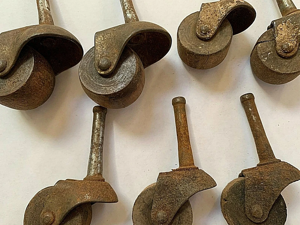Lot of 7 Antique Victorian Cast Iron Furniture Castors with wooden Wheels  - Image 2 of 4