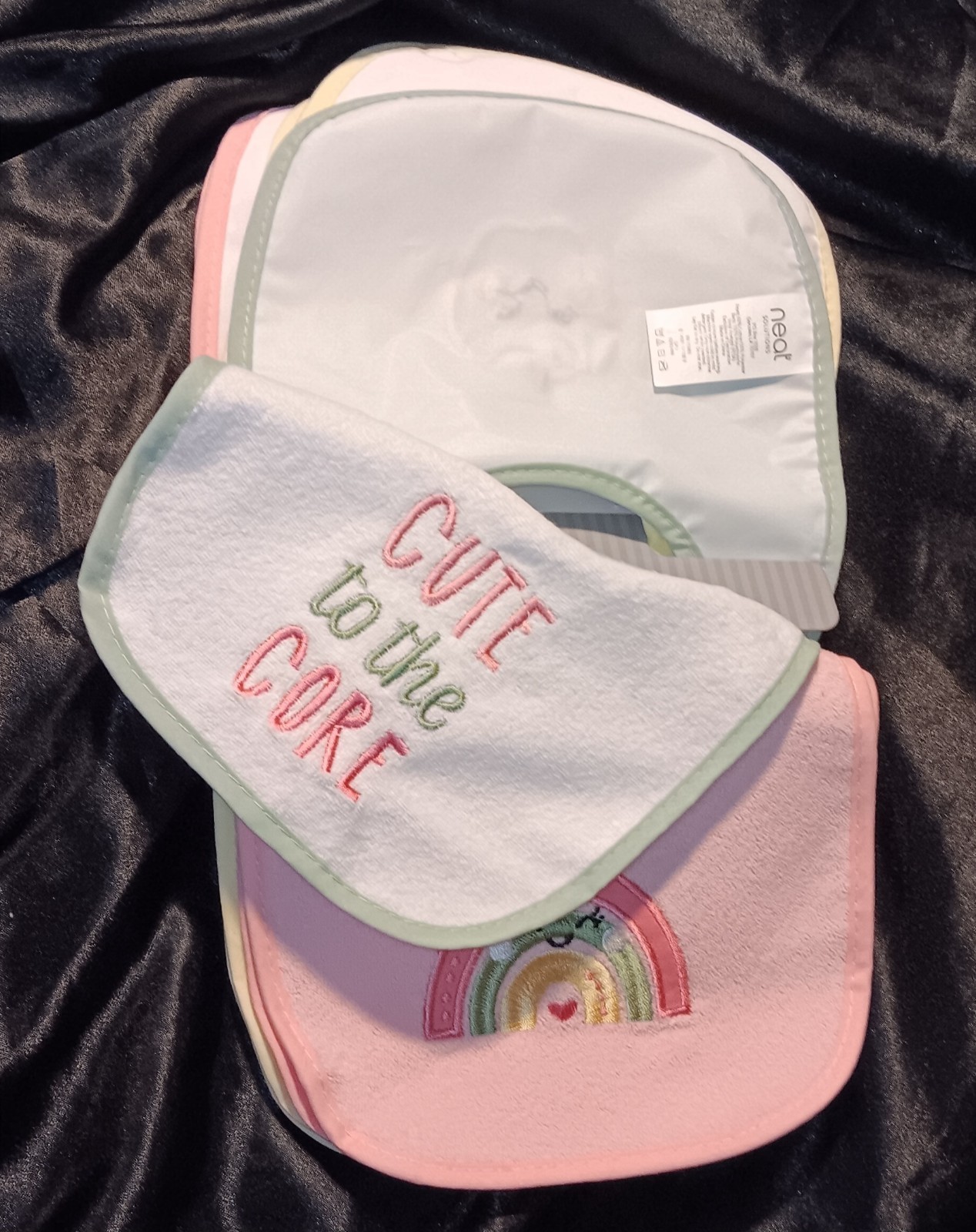 NEAT SOLUTIONS 10 PACK INFANT GIRL STAY DRI/PVC FREE BIB SET. NEW. 0+ MONTHS