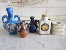 Souvenir. Anfore in ceramica e portacandela in pietra. Lotto 5 pezzi.