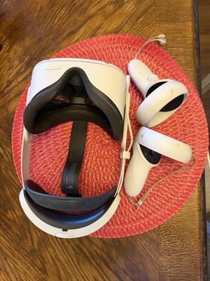 Oculus Meta Quest 2- With Extra Battery Pack and Two Controllers