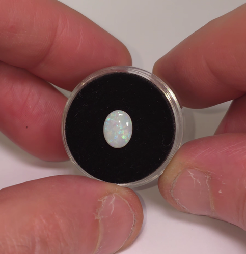 Australian Coober Pedy opal. 9 x 7mm. 0.8ct. Oval. Natural solid opal - Video 1 of 1