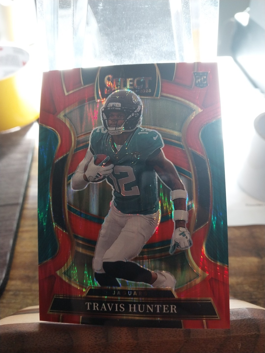 2025 Panini Select Concourse Travis Hunter Red Prizm Shock /249