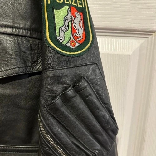 Super sick authentic vintage german police leather jacket. image 3