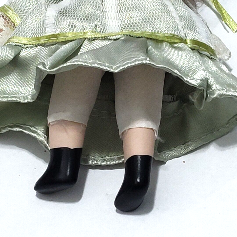 5inch Porcelain Doll Movable Brown Curly Hair White dress Green Bow