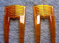 Matched pair of amber celluloid hair pins or hair combs