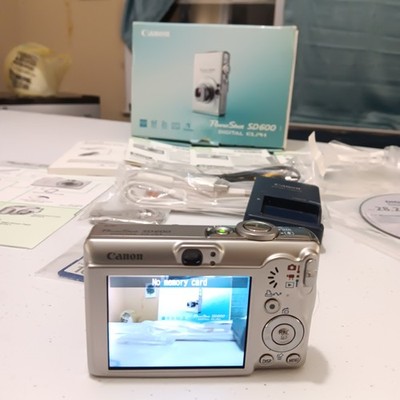 Canon PowerShot Digital ELPH SD600 6.0MP Camera in box complete tested working