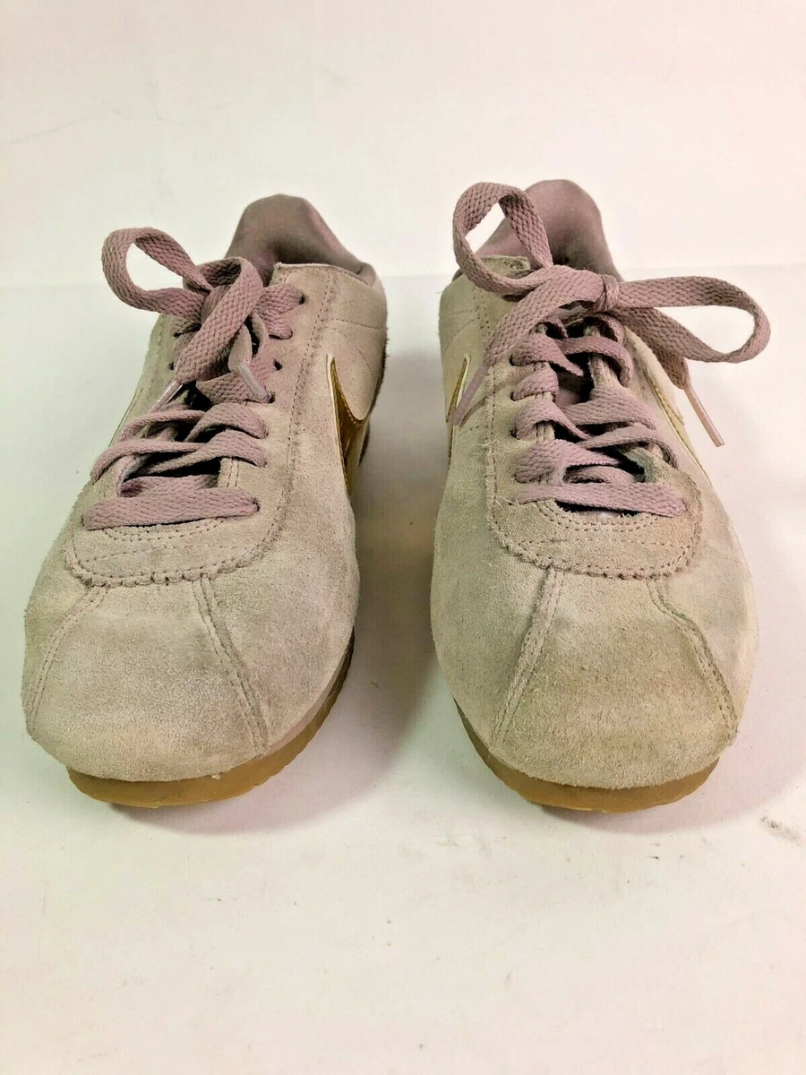 Nike taupe with gold swoosh suede cortez trainers hotsell