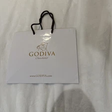 White Godiva chocolatier paper bag With Brown Straps