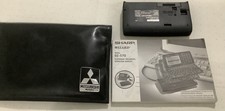 Sharp Wizard OZ-570 with Dock Pocket Organizer Personal PDA Data 256 KB UNTESTED