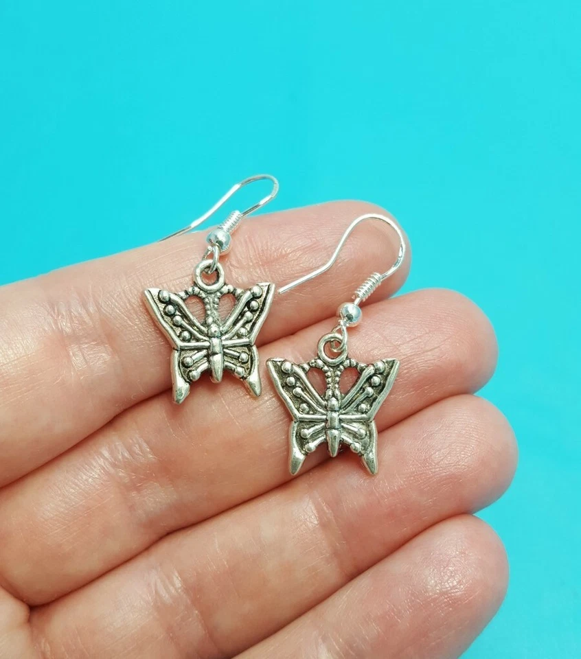 Bonitos pendientes colgantes de mariposa con ganchos de plata de ley tibetanos Foto 4 de 4