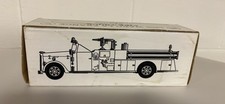 Ertl 1955 Ward LaFrance Fire Truck Bank-New but wear on box-1/30