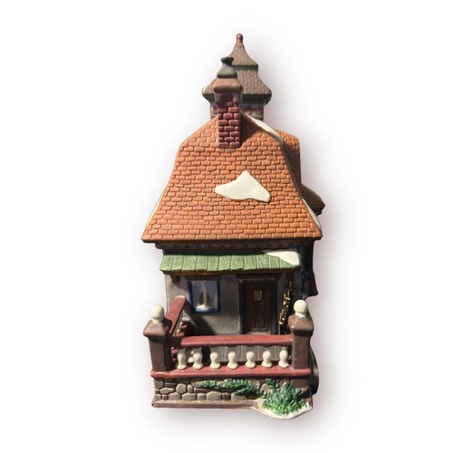Tienda iluminada de porcelana Heartland Valley Village East Side Souvenirs 2001 - Imagen 11 de 12