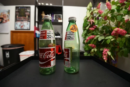 (1) Vintage Green Plastic 32 oz "Easy-Goer" Coca-Cola Bottle from 1970s