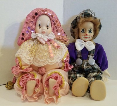 small porcelain clown dolls