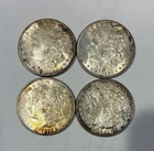 Lot of four 1921 Morgan silver dollars