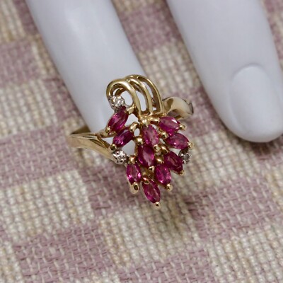 ESTATE TEN KARAT YELLOW GOLD HALF CARAT RUBY & DIAMOND RING (size 8.5)