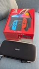 Nintendo Switch OLED Model console boxed with accessories