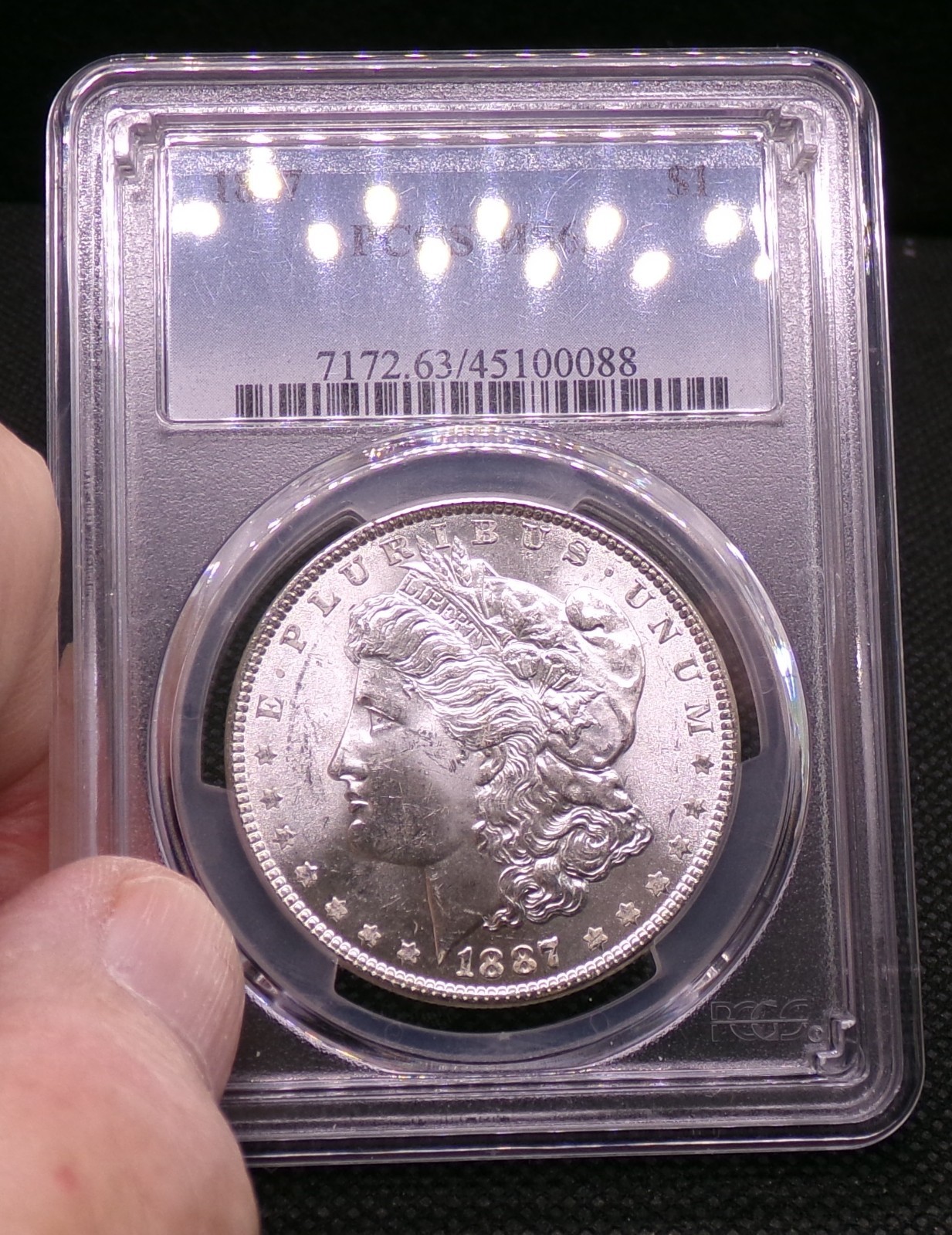 PCGS 1887  MS63  Morgan Silver Dollar.  Nice luster.