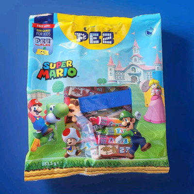 PEZ Spender Super Mario mit Mix Tüte Fruit Cola Candys Fizzy Fruit Mix und Rolls