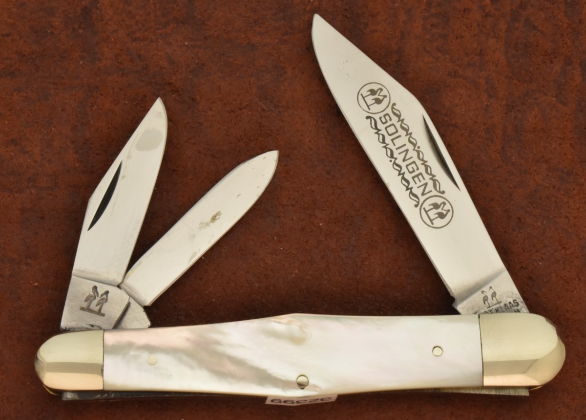 VINTAGE KISSING CRANE SOLINGEN GERMANY MOTHER OF PEARL WHITTLER