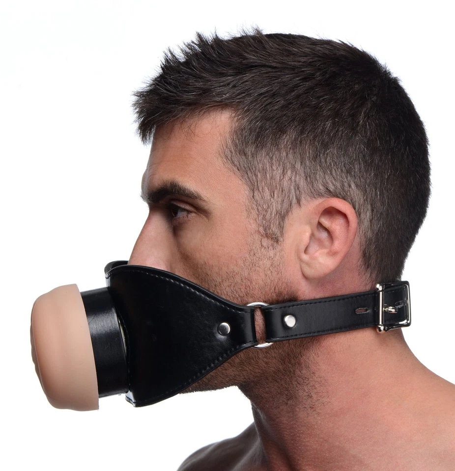 Mordaza bucal cara coño sexo oral Foto 2 de 4